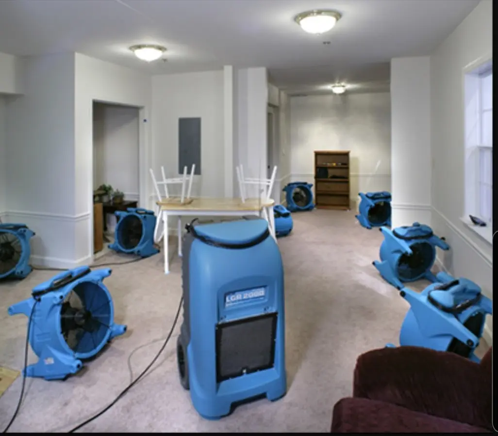 Air movers and dehumidifier setup for Water Damage Restoration in Towson